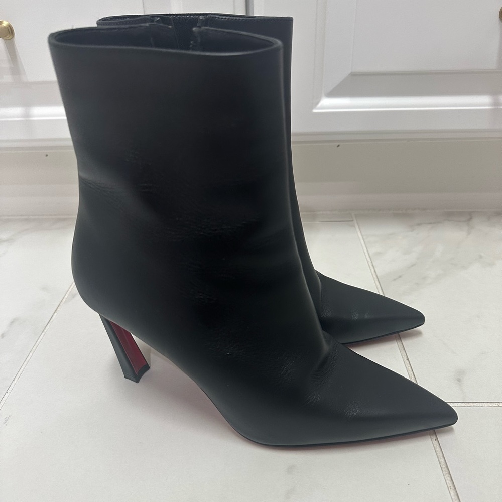 CHRISTIAN LOUBOUTIN CONDORA POINTED TOE BOOTIE